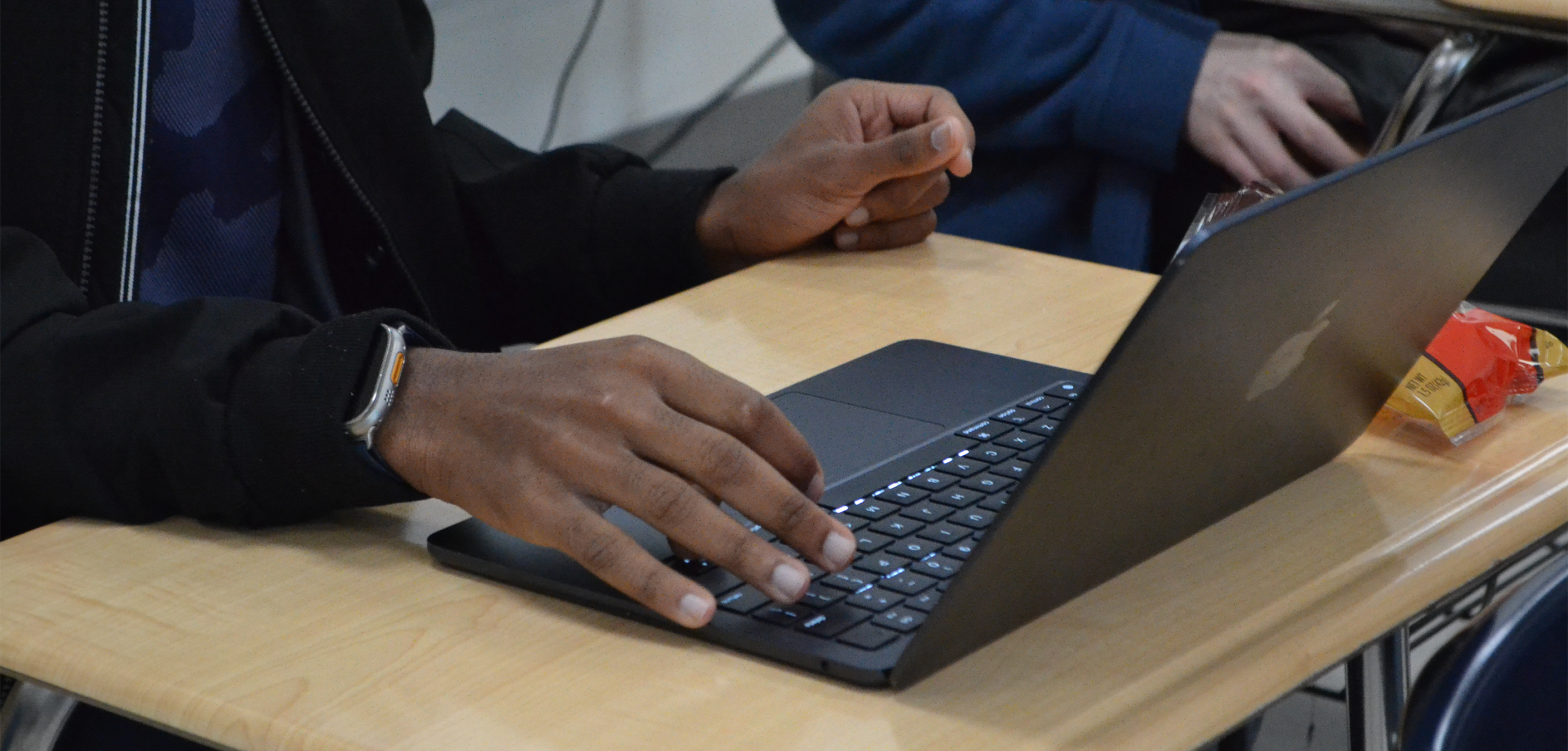 A student in Creative Writing works on their next story.